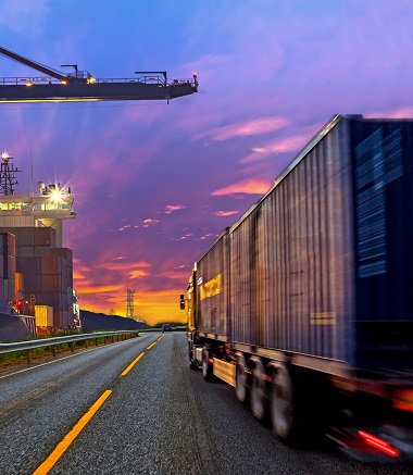 Truck transport container on the road to the port.